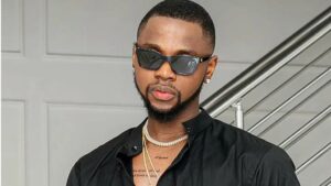 "Kizz Daniel Shares Glimpse of Third Son Amid Allegations of Domestic Abuse"