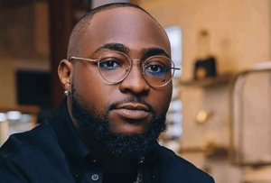 Davido Clarifies Lack of Communication with Wizkid and Burna Boy in Recent Interview