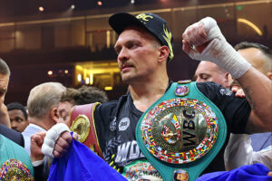 From Grief to Glory: Usyk Claims Undisputed Title, Honors Father in Emotional Outpouring