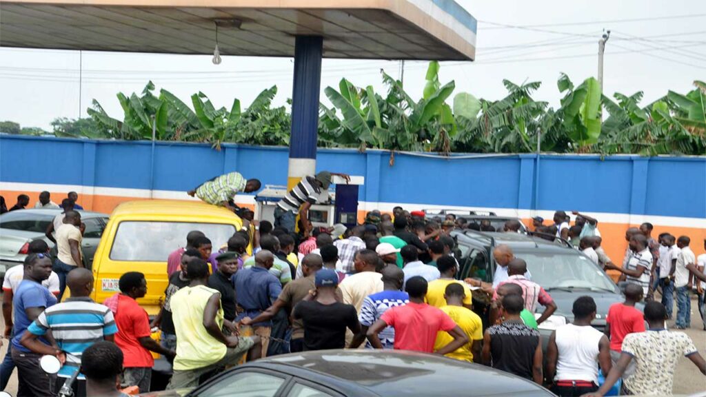 Toil and Trouble: Nigerians Mark Workers' Day in Fuel Queue Frustration, Demand New Minimum Wage