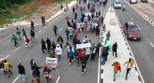 Benin City Erupts in Protest: Carnival Atmosphere on Ring Road