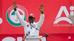 PDP 's Asue Ighodalo speaking at a podium, gesturing emphatically as he discusses plans to contest Edo election results.