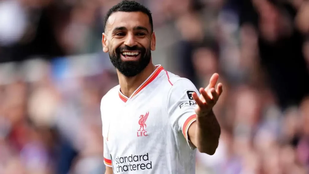 Controversy Erupts as Deeney Questions Salah's World-Class Status, Champions Vinícius Jr. as Superior Role Model